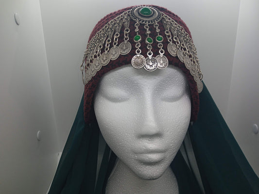 Green jewelled, red hat, green scarfed Hatun hat