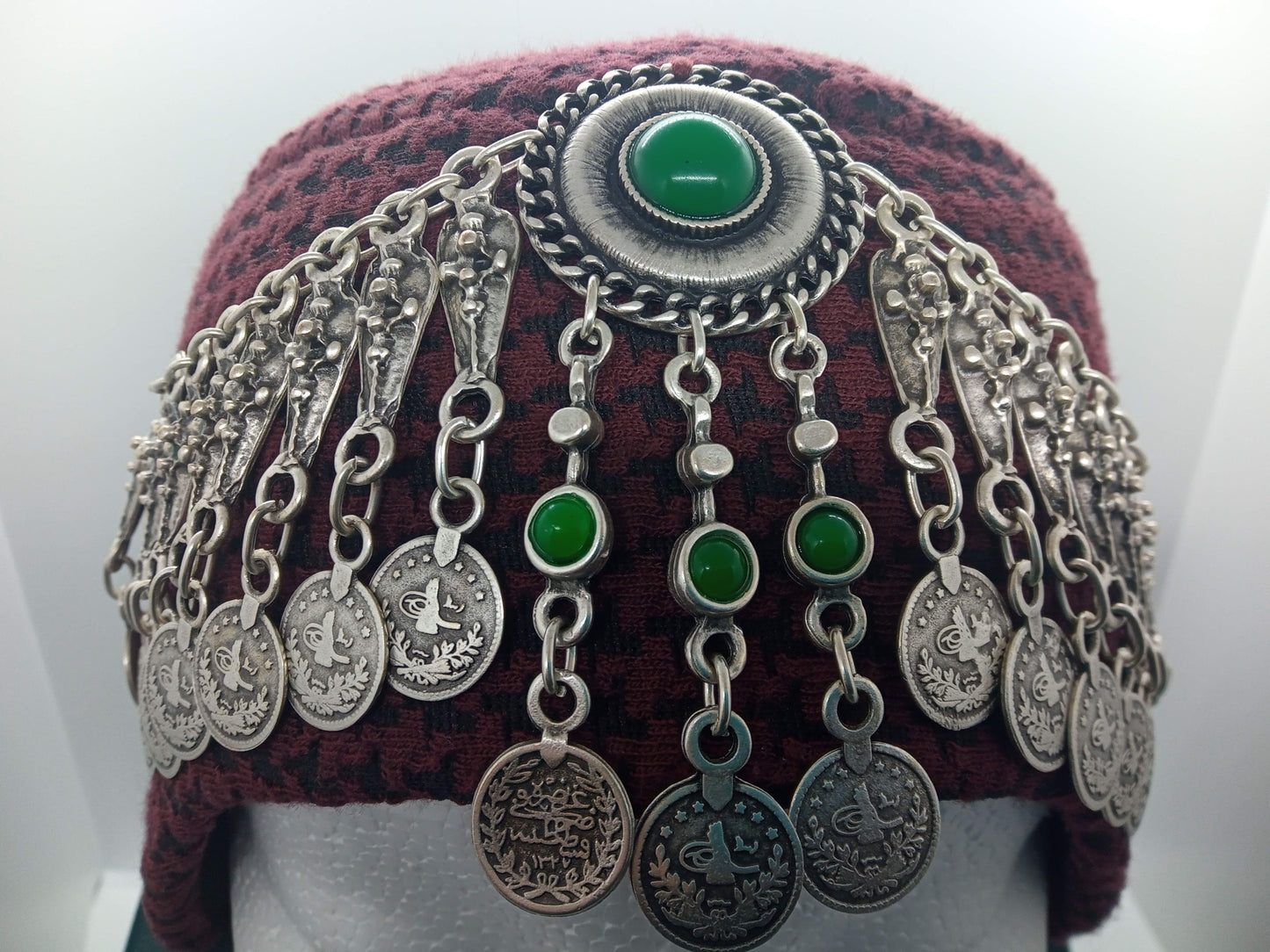 Green jewelled, red hat, green scarfed Hatun hat