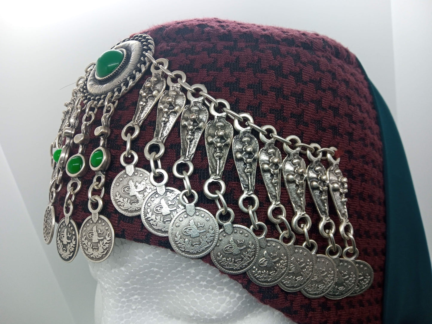 Green jewelled, red hat, green scarfed Hatun hat